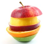Sliced Apple, orange, lemon, lime stacked up