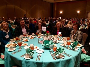 Award winners Beth Allen and Vickie Martin with their guests at the Professional Women’s Conference at the Embassy Suites in Cary, NC on October 22, 2015. 